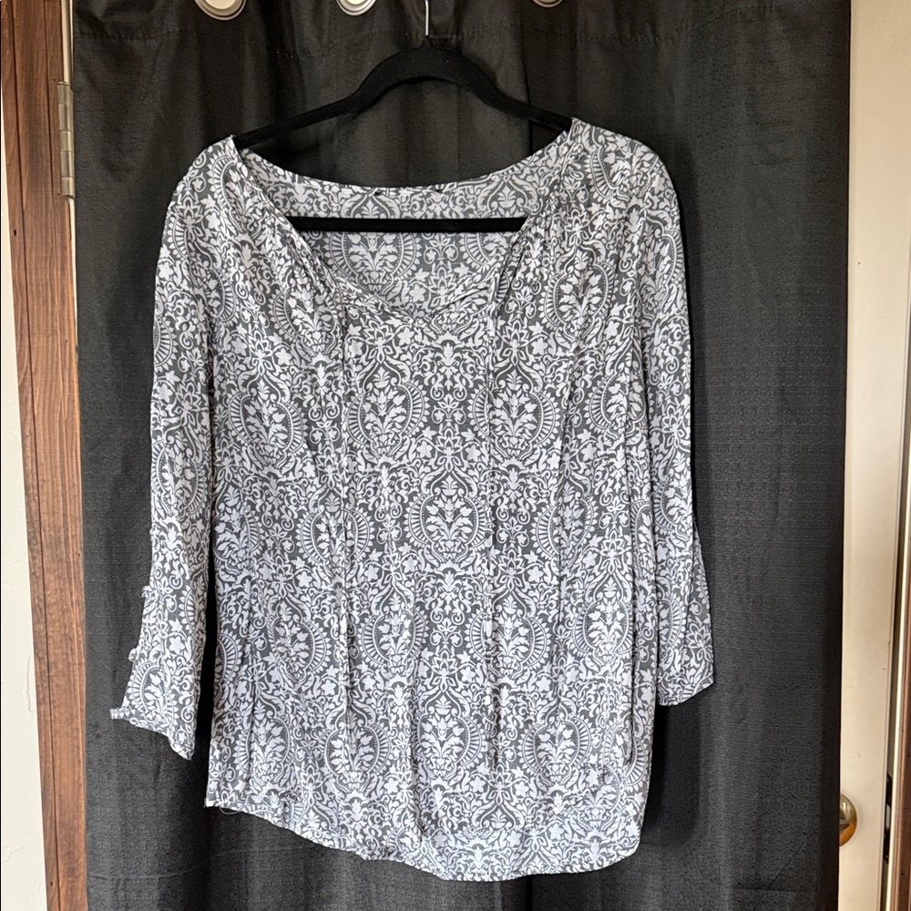 Elegant Black and White Patterned Blouse
